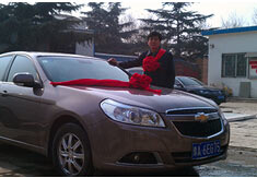 超前涂料獎勵員工轎車，真石漆生產(chǎn)廠家！